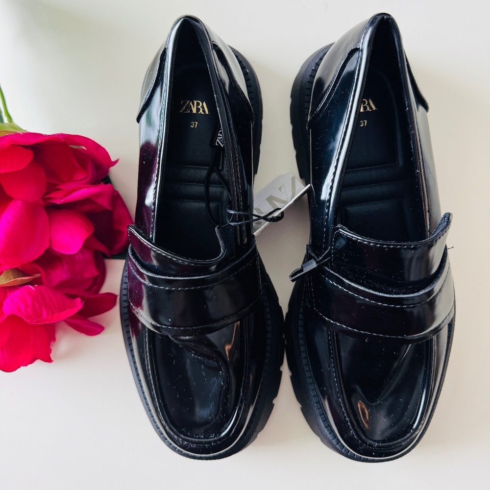 Zara Loafers. Faux patent leather finish. Saddle detail at instep. Rounded toe.
